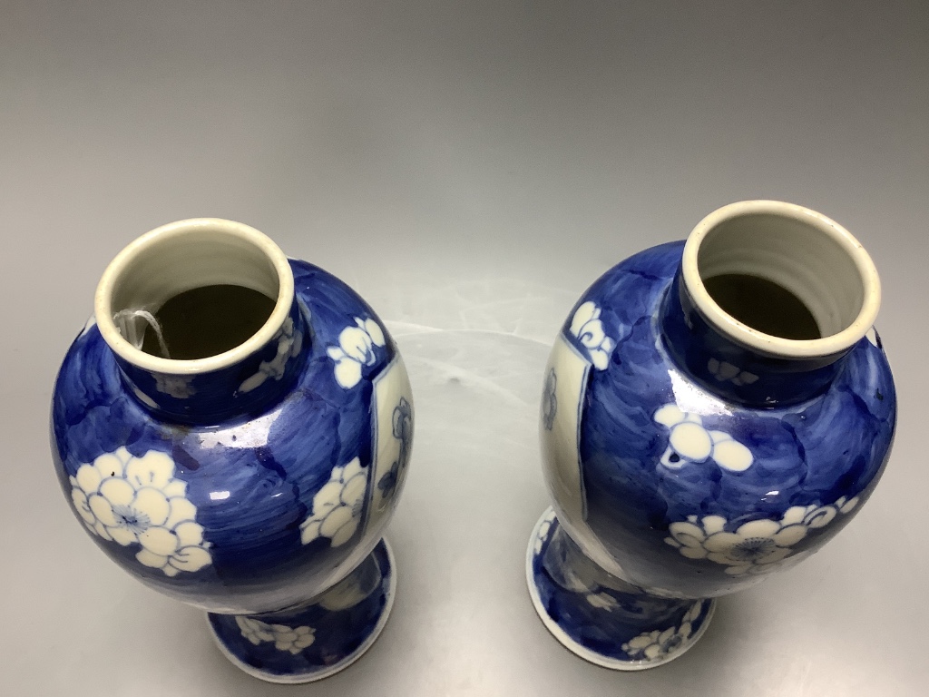 A pair of Chinese blue and white vases, Kangxi mark c.1900, height 22.5cm